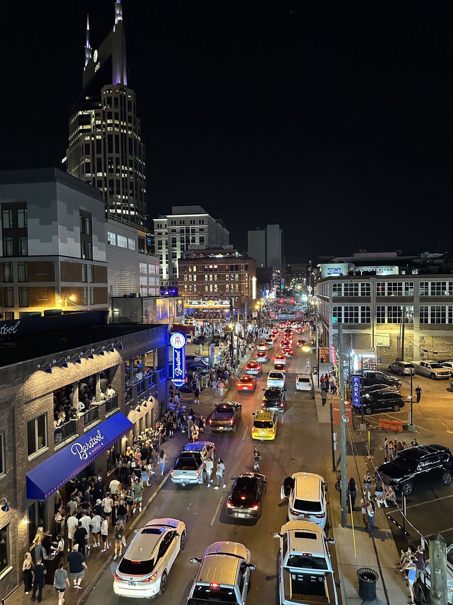 May be an image of 1 person and skyscraper